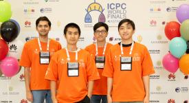 The UT Programming Team (from left to right) Aaryan Prakash, Caleb Hu, Mark Wen, and coach Trung Dang.