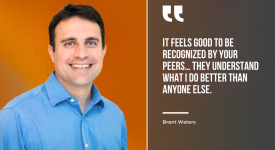 Professor Brent Waters in blue button-down shirt against a burnt orange background and “It feels good to be recognized by your peers… they understand what I do better than anyone else.” - Brent Waters in white text against a charcoal gray background on the right.