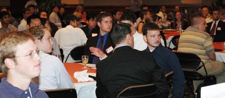 Guests listen to Dr. Lavender&#039;s opening remarks.