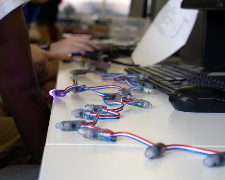 LED lights running an Academy for Women student's coded pattern