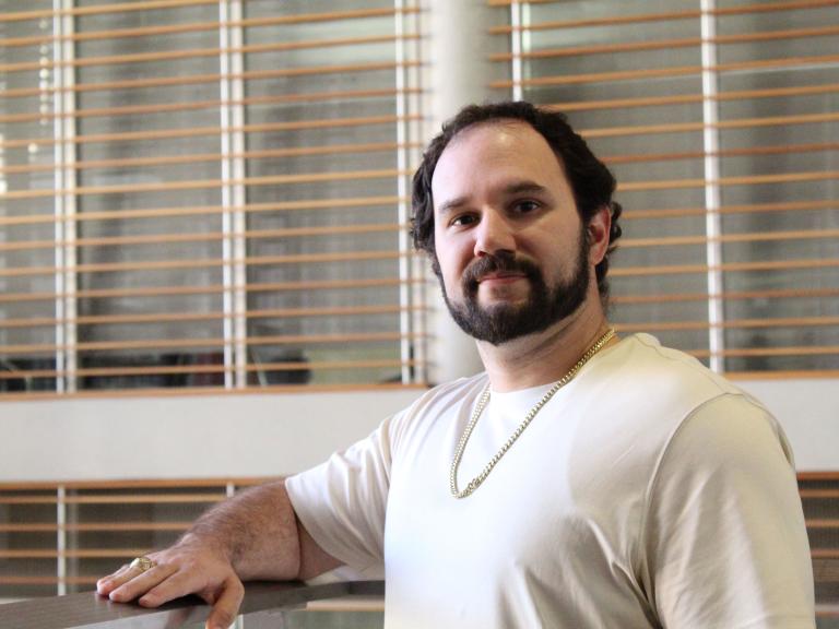 A portrait of a young man with a beard