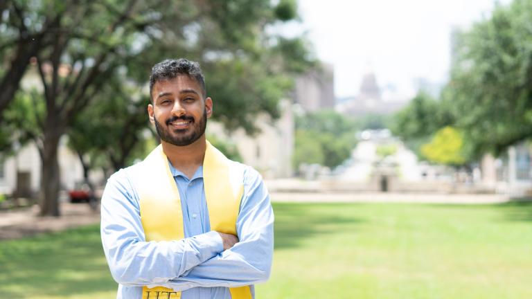 UT Computer Science Alum Sriram Hariharan on UT campus with the capital in the background.